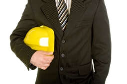 businessman holding hard hat